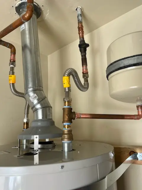 Water heater installation and plumbing repair in The Circles